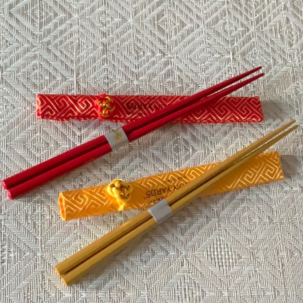Two pairs of lacquered Chopsticks gold and red